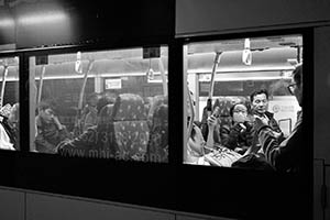 People on a bus at night, Sheung Wan, 19 February 2015