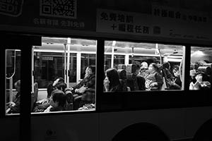 People on a bus at night, Sheung Wan, 19 February 2015