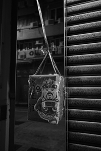 Lunar New Year decoration outside a closed shop, Sheung Wan, 19 February 2015