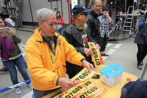 Stall  beside a pro-democracy march from Victoria Park to Central, Hennessy Road, 1 February 2015
