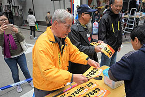 Stall beside a pro-democracy march from Victoria Park to Central, Hennessy Road, 1 February 2015