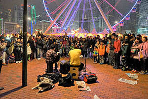 Street music performance close to the Hong Kong Observation Wheel, Central Harbourfront, 20 February 2015