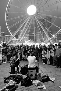 Street music performance close to the Hong Kong Observation Wheel, Central Harbourfront, 20 February 2015