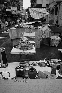 A small Guanyin statue and other used items being sold on the street, Sham Shui Po, 21 February 2015