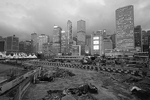 Buildings in Central and a construction site near the Central Harbourfront, 31 March 2015