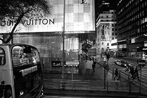 Street scene at night at the junction of Des Voeux Road Central and Pedder Street, Central, 31 March 2015