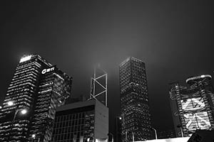 Commercial buildings on a foggy night, Central, 7 March 2015