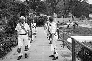 Morris dancers at Silvermine Bay beach, Lantau, 15 March 2015