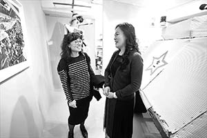 Guests at an exhibition of Kacey Wong’s art, Amelia Johnson Contemporary, Central, 4 March 2015