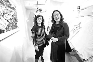 Guests at an exhibition of  Kacey Wong’s artwork, Amelia Johnson Contemporary, Central, 4 March 2015