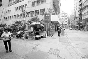 Residential buildings and fruit hawker stall, Kom U street, Sheung Wan, 5 March 2015