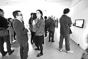 Guests at an exhibition opening, Para Site, Quarry Bay, 6 March 2015