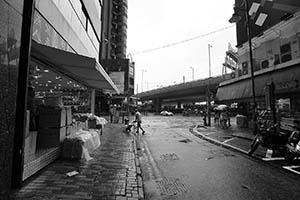 Street scene in rainy weather, Wing Lok Street, Sheung Wan, 20 May 2015