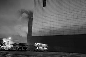 Bus parking area and Central Police District Headquarters at night, Western Fire Services Street, Sheung Wan, 26 May 2015