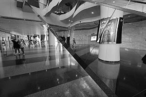 Reflection on an escalator in the Hong Kong Convention and Exhibition Centre, Wanchai, 29 May 2015