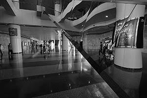 Reflection on an escalator in the Hong Kong Convention and Exhibition Centre, Wanchai, 29 May 2015