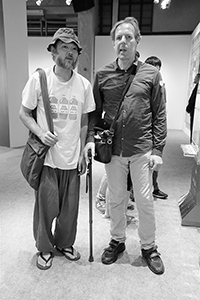 MC Yan and Gerard Henry, at 'Wipe Out', an exhibition of work by French artist Invader, hosted by The Hong Kong Contemporary Art Foundation, PMQ, Aberdeen Street, Central, 1 May 2015