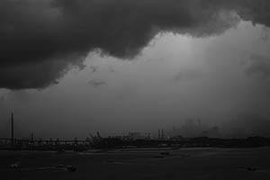 Stonecutters Island in cloudy weather, viewed from Sheung Wan, 9 May 2015