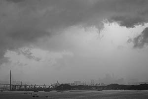 Stonecutters Island in cloudy weather, viewed from Sheung Wan, 9 May 2015