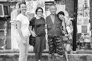 Frog King with guests, outside his studio in the Cattle Depot Artist Village, To Kwa Wan,7 June 2015