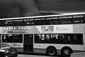 Message on a bus concerning the process for selecting the Hong Kong Chief Executive, Central, Hong Kong Island, 13 June 2015