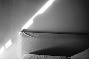 Light on a wall in a bedroom, Sheung Wan, 15 June 2015