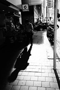 Light and shadow on Des Voeux Road Central, Sheung Wan, 18 June 2015