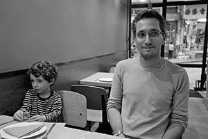 Academic Opher Mansour with his son at a restaurant, Sai Ying Pun, 3 June 2015