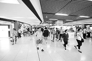 People walking to New Town Plaza from Sha Tin MTR station, Sha Tin, 12 July 2015