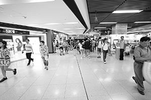 People walking to New Town Plaza from Sha Tin MTR station, Sha Tin, 12 July 2015