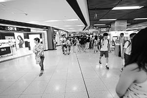 People walking to New Town Plaza from Sha Tin MTR station, Sha Tin, 12 July 2015