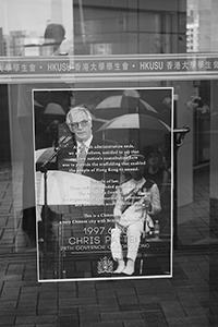 Poster depicting Chris Patten on a window near the Student Union, University of Hong Kong, 22 August 2015