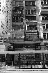 Tram stop and buildings on Des Voeux Road West, Sheung Wan, 5 September 2015