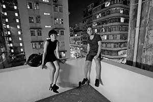 Guests at a rooftop party for a new art space 'Things That Can Happen', Sham Shui Po, Kowloon, 5 September 2015