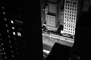 Buildings and a construction site viewed from an apartment in Sheung Wan, 17 September 2015