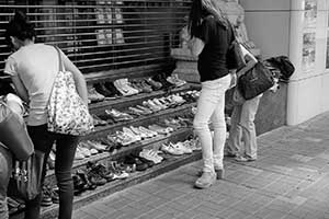 Pop-up shoe shop outside a closed bank building, Central, 13 September 2015