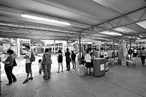 Buses near the Tsim Sha Tsui Star Ferry terminal, 2 September 2015