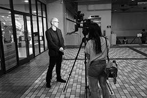 Academic Timothy O'Leary being interviewed during a demonstration on the HKU campus concerning perceived threats to academic freedom, 9 October 2015