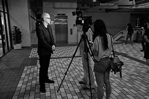 Academic Timothy O'Leary being interviewed during a demonstration on the HKU campus concerning threats to academic freedoms, 9 October 2015