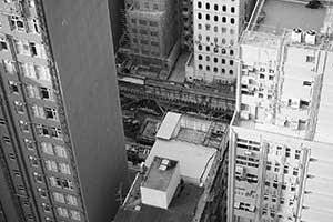 Buildings and construction site viewed from an apartment in Sheung Wan, 24 October 2015