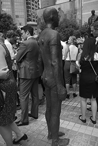 One of the sculptures from Antony Gormley's Event Horizon project, installed in Statue Square, 19 November 2015
