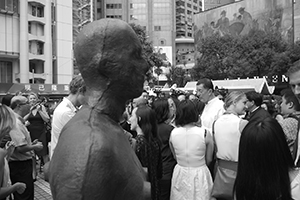 One of the sculptures from Antony Gormley's Event Horizon project, installed in Statue Square, 19 November 2015