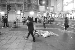 Person asleep in the street, Central, 19 November 2015