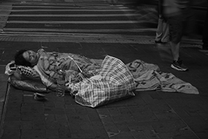 Person asleep in the street, Central, 19 November 2015