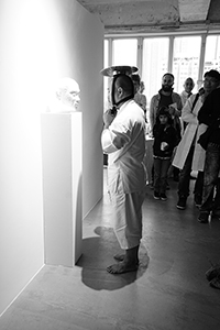 Ho Siu Kee in performance at 'The Human Body: Measure and Norms' exhibition at Blindspot Gallery, Wong Chuk Hang Road, Wong Chuk Hang, 5 December 2015