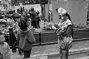 Clown at a carnival, Sheung Wan Cultural Square, 20 December 2015