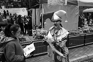 Clown at a carnival, Sheung Wan Cultural Square, 20 December 2015