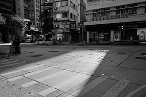 Street scene at the junction of Queen Street and Queen's Road West, Sheung Wan, 25 January 2016
