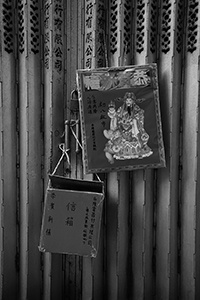 Lunar New Year decoration on the shutters of a building, Sheung Wan, 7 February 2016