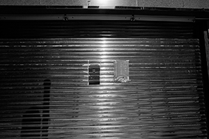 Mailbox on the shutters of a business closed for the Lunar New Year holiday, Sheung Wan, 7 February 2016